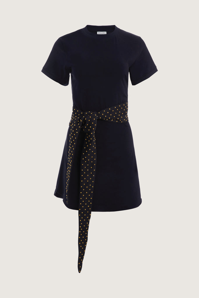 Black Archive / Lea Dress Crafted from premium cotton, this crew neck t-shirt dress boasts a curved hemline. Finished with attached denim studded belt. This item is FINAL SALE.