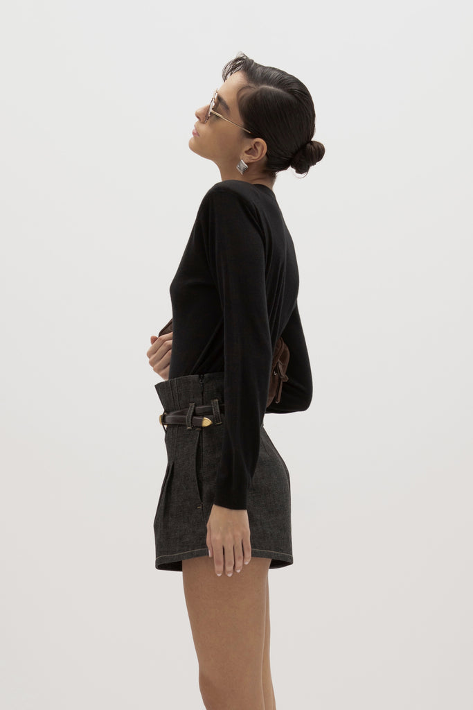 Black Margot LS Sweater -Crewneck long sleeve sweater -Crafted in a lightweight silk and cashmere blend -Single-layer ribbing at neckline, cuffs, and hem-Subtle shoulder structure with removable, self-covered shoulder pads-Interior shoulder seam with discreet snaps to remove pads  Ingryd is 5'10