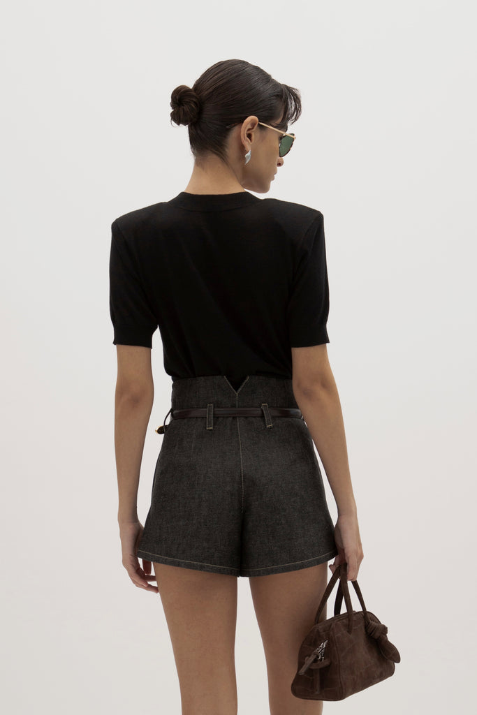 Black Margot SS Sweater -Crewneck short sleeve sweater -Crafted in a lightweight silk and cashmere blend -Single-layer ribbing at neckline, cuffs, and hem-Subtle shoulder structure with removable, self-covered shoulder pads-Interior shoulder seam with discreet snaps to remove pads  Ingryd is 5'10