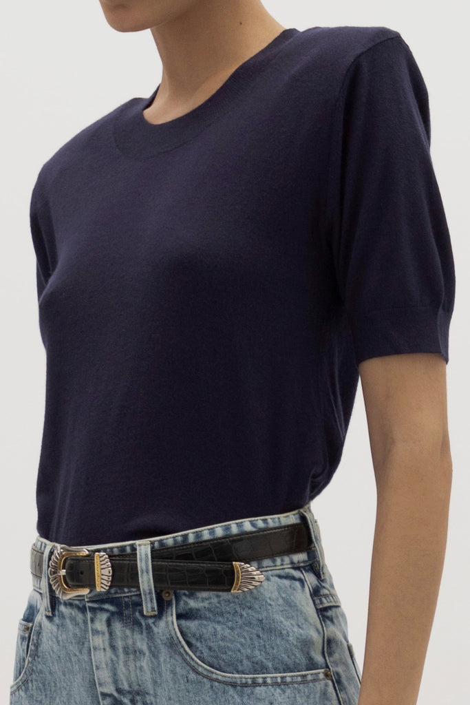 Navy Margot SS Sweater -Crewneck short  sleeve sweater -Crafted in a lightweight silk and cashmere blend -Single-layer ribbing at neckline, cuffs, and hem-Subtle shoulder structure with removable, self-covered shoulder pads-Interior shoulder seam with discreet snaps to remove pads  Ingryd is 5'10