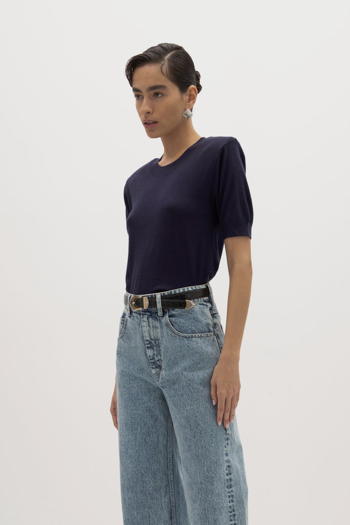 Navy Margot SS Sweater -Crewneck short  sleeve sweater -Crafted in a lightweight silk and cashmere blend -Single-layer ribbing at neckline, cuffs, and hem-Subtle shoulder structure with removable, self-covered shoulder pads-Interior shoulder seam with discreet snaps to remove pads  Ingryd is 5'10
