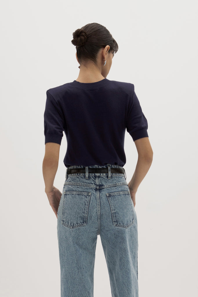 Navy Margot SS Sweater -Crewneck short  sleeve sweater -Crafted in a lightweight silk and cashmere blend -Single-layer ribbing at neckline, cuffs, and hem-Subtle shoulder structure with removable, self-covered shoulder pads-Interior shoulder seam with discreet snaps to remove pads  Ingryd is 5'10