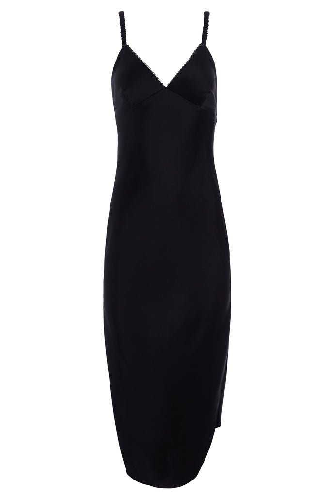 Black Paras Dress The Paras vegan silk midi slip dress features a v-neckline with scalloped trim, bust darts, ruched elastic straps, a low cut open back, and a curved, vented hemline.*Sale merchandise is exchangeable for size or store credit. 