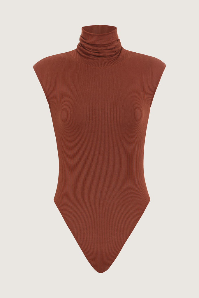 Pecan Penny Bodysuit This buttery soft sleeveless ribbed turtleneck bodysuit showcases a sleek silhouette for a versatile wardrobe staple.FINAL SALE 