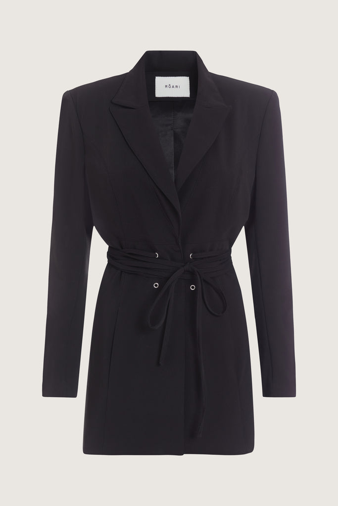 Black Rhodes Blazer This mid-length blazer features a detachable waist tie, allowing you to create a range of looks. The tailored single- breasted style features shoulder pads and front welt pockets. The Kat Trouser compliments the blazer perfectly.Style with The Kat Trouser