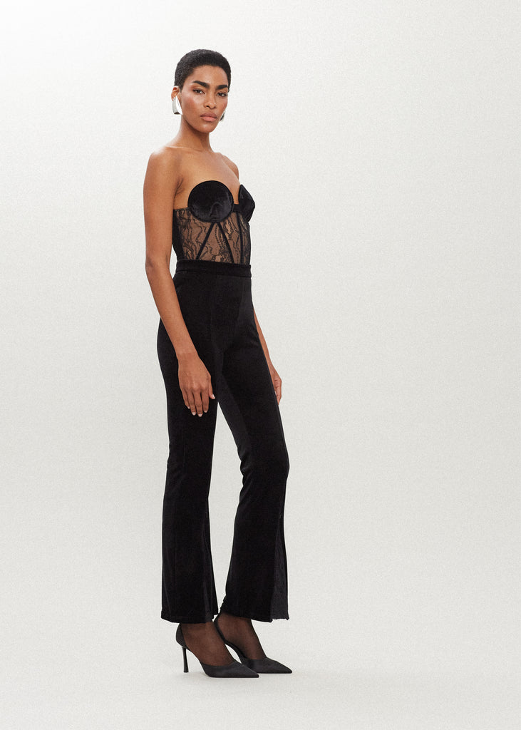 Black Rose Pant High-rise straigh-leg velvet pant featuring hidden zips at front of ankle for option to reveal a lace flared silhouette. *This style has been noted to run one size larger, we suggest sizing down.