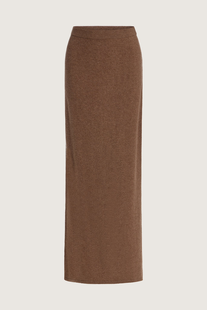 Brown Ava Skirt Delicately soft and consciously crafted, the perfect foundation for creating effortless looks.-Classic maxi skirt silhouette-Full length-Slit at center back-Elastic waistband 🐑 Made with Good Cashmere Standard® wool to support the welfare of cashmere goats We recommend ordering your usual size.Styled with the Olivia Turtleneck