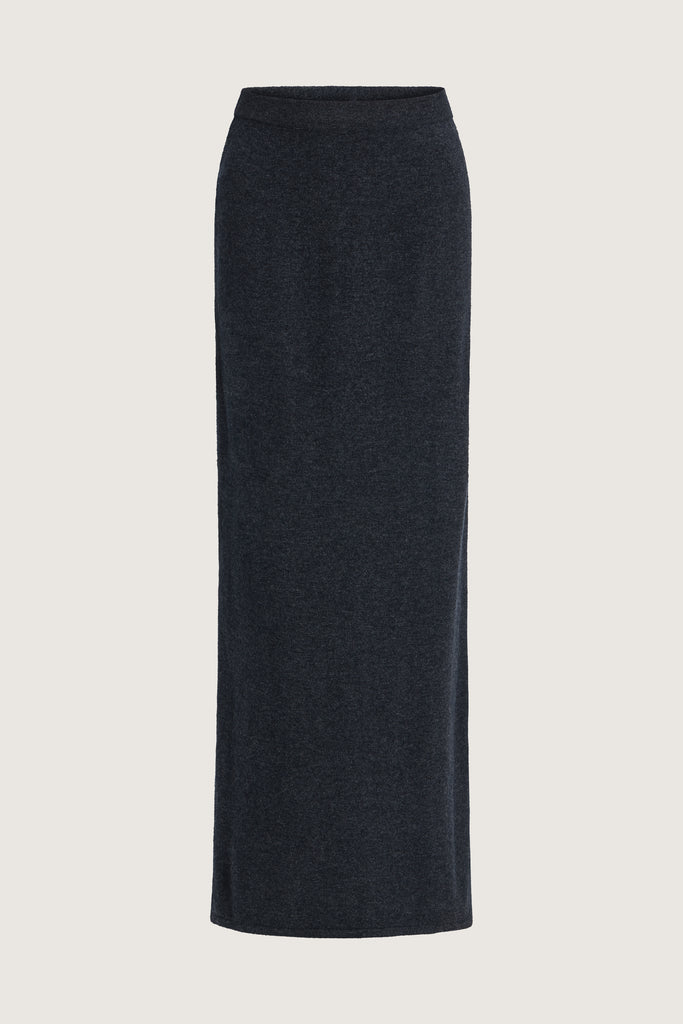 Charcoal Ava Skirt Delicately soft and consciously crafted, the perfect foundation for creating effortless looks.-Classic maxi skirt silhouette-Full length-Slit at center back-Elastic waistband 🐑 Made with Good Cashmere Standard® wool to support the welfare of cashmere goatsWe recommend ordering your usual size.Styled with the Olivia Turtleneck