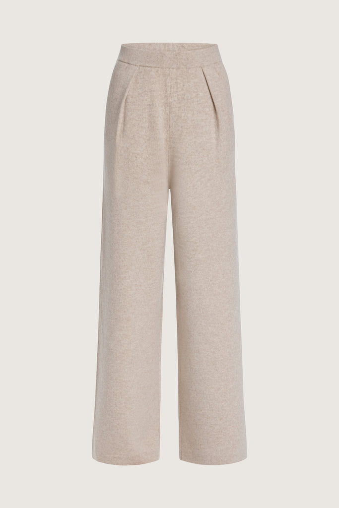 Oatmeal Beverly Trouser Delicately soft and consciously crafted, a versatile piece designed for ultimate comfort.-Wide-leg silhouette for a relaxed fit-Elastic waistband-Center front pleats-Side pockets-Back patch pockets🐑 Made with Good Cashmere Standard® wool to support the welfare of cashmere goats We recommend ordering your usual size.Styled with the Nico Shirt
