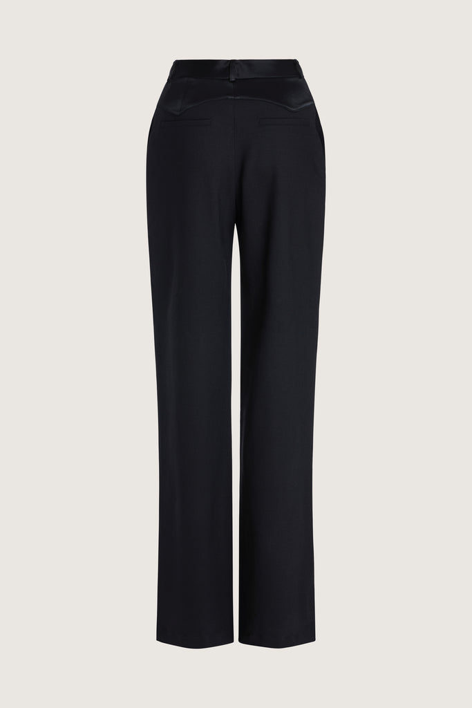 black Mia Trouser The Mia trouser: Expertly tailored in a silhouette that echoes the collection's blend of classic tailoring and modern details.-Relaxed leg trouser -Corset style satin contrast waistband-Zip fly with hook and eye closure-Self-doubled belt loops -Tailored fit with fluid drape-On seam front pockets -Faux welt back pockets -Two inch seam allowance at hem We recommend ordering your usual size.Styled with the Vivien LS Top