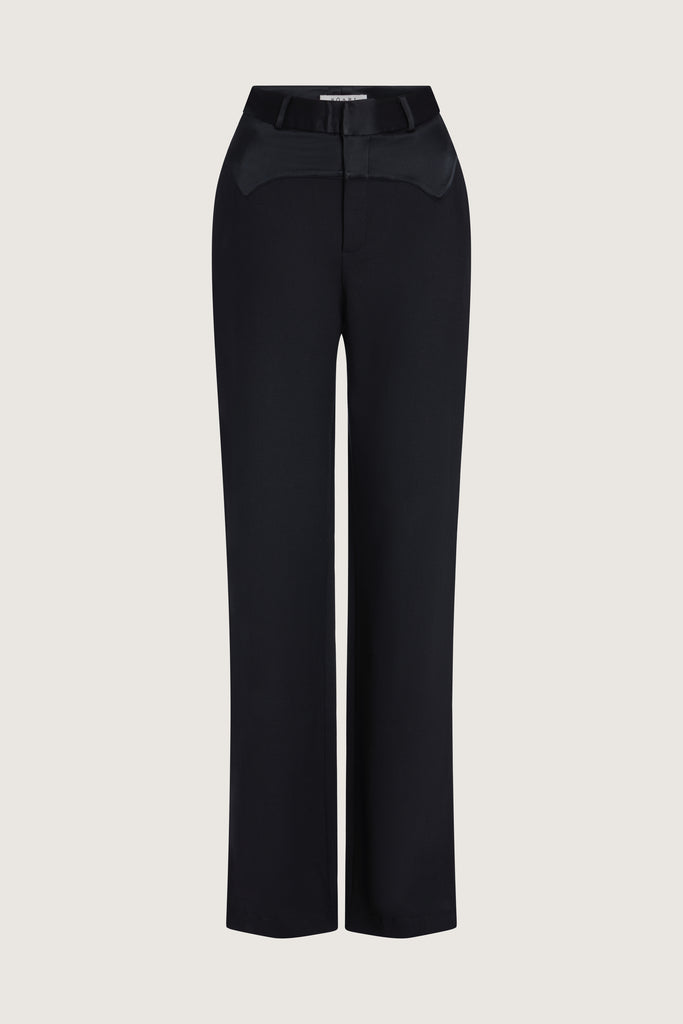 Black Mia Trouser The Mia trouser: Expertly tailored in a silhouette that echoes the collection's blend of classic tailoring and modern details.-Relaxed leg trouser -Corset style satin contrast waistband-Zip fly with hook and eye closure-Self-doubled belt loops -Tailored fit with fluid drape-On seam front pockets -Faux welt back pockets -Two inch seam allowance at hem We recommend ordering your usual size.Styled with the Vivien LS Top