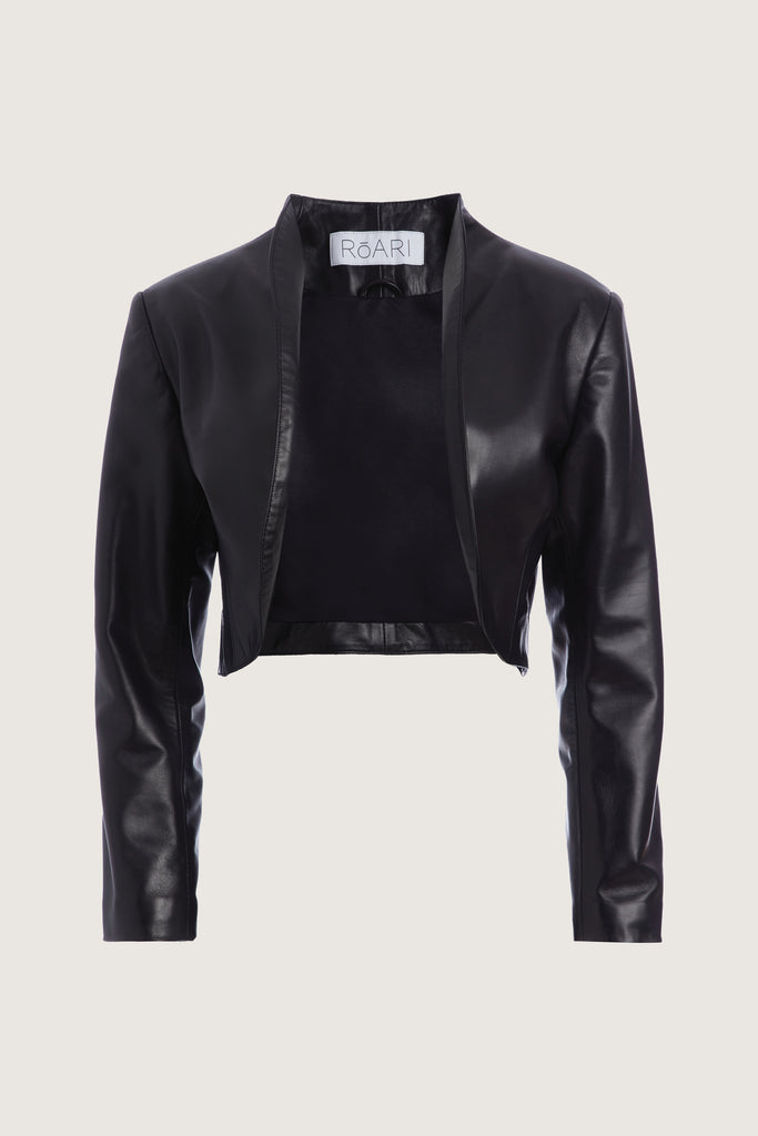 Black Saint Bolero This cropped bolero-style jacket is cut from luxurious Italian leather. It features an open front, internal zip-pocket, and shoulder pads for added structure.