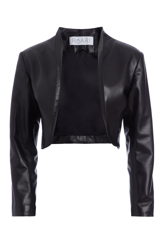 Black SAINT BOLERO This cropped bolero-style jacket is cut from luxurious Italian leather. It features an open front, internal zip-pocket, and shoulder pads for added structure.