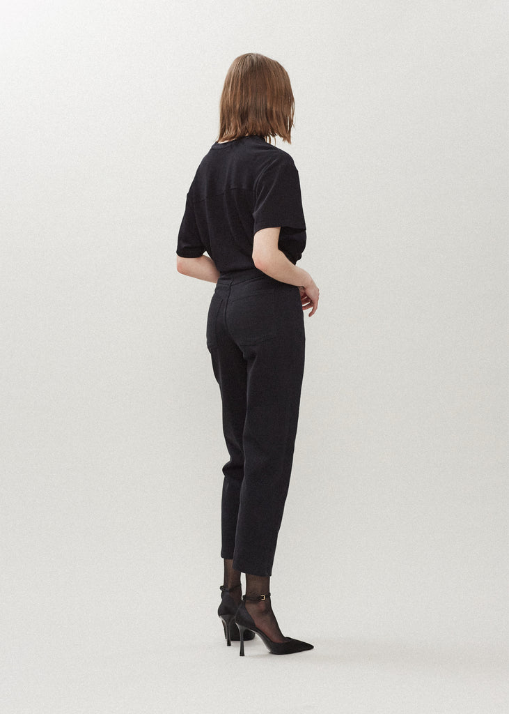 Jet Black Sarah Stretch Jean Vintage inspired high-rise jean with a relaxed straight-leg, cropped ankle length and seams down the front. Each hand-finished pair has a branded enameled button. Made in New York. 