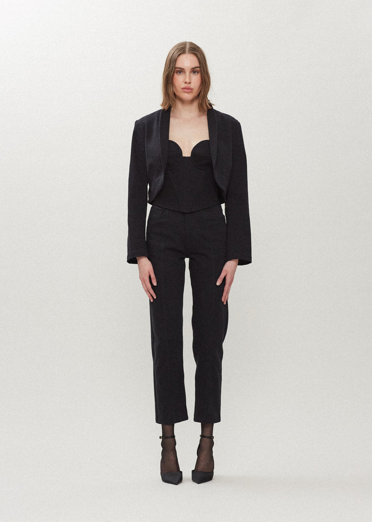Jet Black Sarah Stretch Jean Vintage inspired high-rise jean with a relaxed straight-leg, cropped ankle length and seams down the front. Each hand-finished pair has a branded enameled button. Made in New York. 