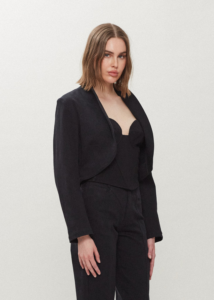 Jet Black Sasha Stretch Bolero This bolero jacket is cut from a cotton denim elastane blend. It features an open front lapel and cropped length.