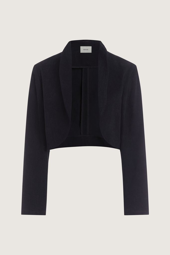 Jet Black Sasha Stretch Bolero This bolero jacket is cut from a lightweight cotton denim elastane blend, designed to feel weightless and breathable during all seasons . It features an open front lapel and cropped length.Styled with The Sarah Stretch Jean | The Chloe Corset