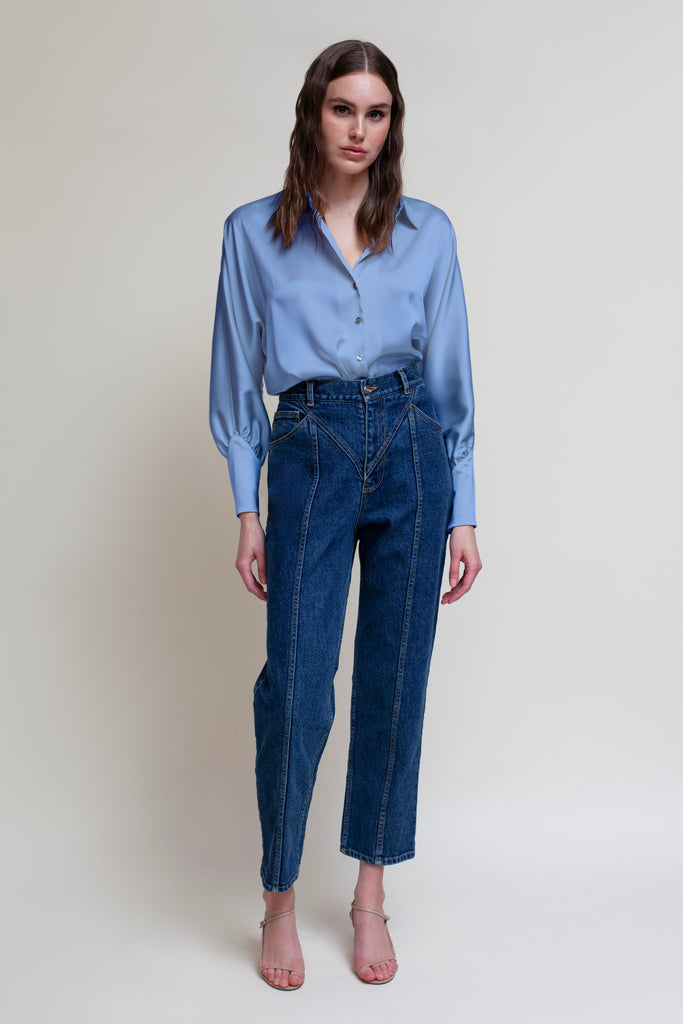 Sky MARNA SHIRT Made with vegan silk, this button-down shirt features blouson sleeves and concealed zippers at the wrist. It includes removable shoulder pads, mother of pearl buttons, and is wrinkle-resistant.*All sale merchandise is exchangeable for size only.