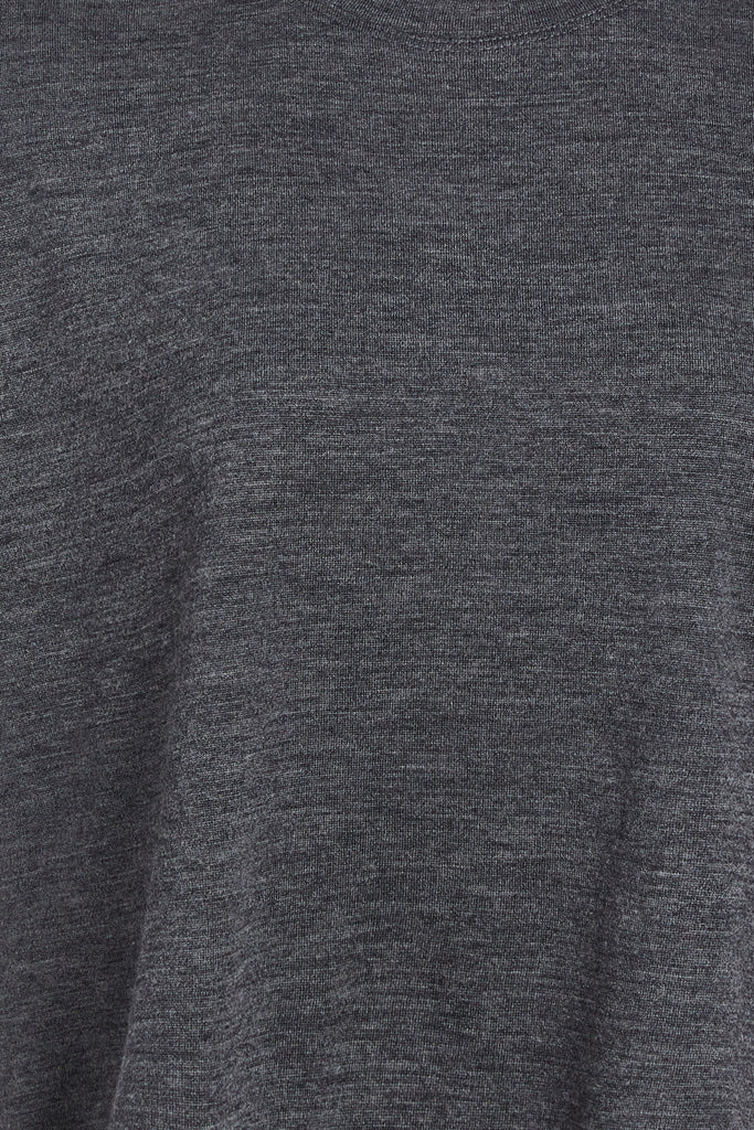 Charcoal Grey Zoey Tee This tee crafted from premium merino wool features an oversized relaxed silhouette and a lightly sheer finish.Style with The Sarah Stretch Jean