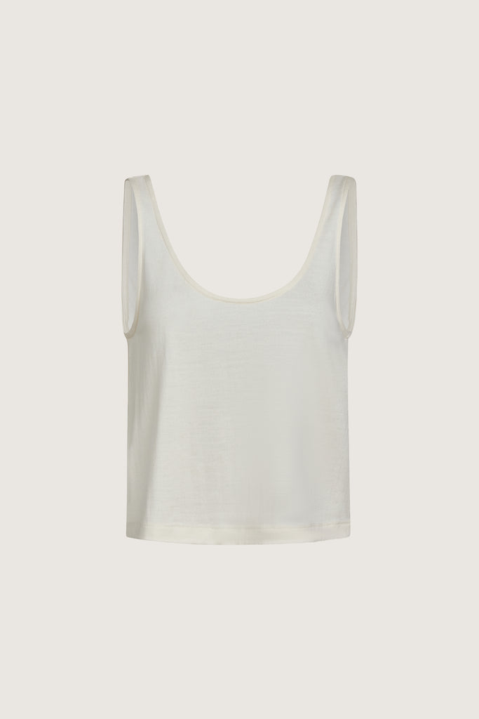 Bone Zoey Tank This tank top crafted from premium merino wool features a plunging scoop neckline, low draped back and a lightly sheer finish.Style with The Sarah Stretch Jean