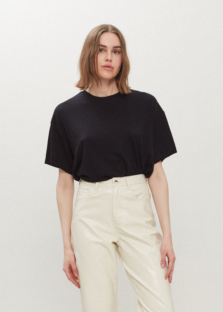 Black Zoey Tee This tee crafted from premium merino wool features an oversized relaxed silhouette and a lightly sheer finish. 