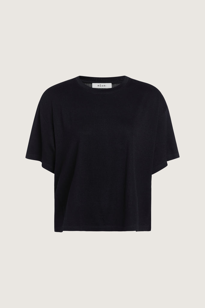 Black Zoey Tee This tee crafted from premium merino wool features an oversized relaxed silhouette and a lightly sheer finish.Style with The Sarah Stretch Jean