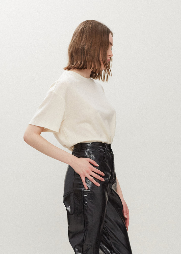 Bone Zoey Tee This tee crafted from premium merino wool features an oversized relaxed silhouette and a lightly sheer finish. 