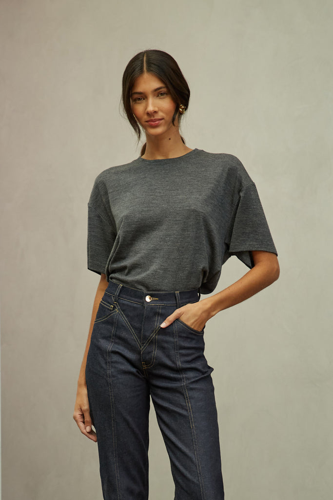 Charcoal Grey Zoey Tee This tee crafted from premium merino wool features an oversized relaxed silhouette and a lightly sheer finish.Style with The Sarah Stretch Jean